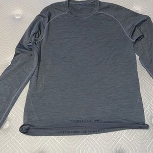 Long sleeve medium lululemon shirt. Great condition. Grey/silver